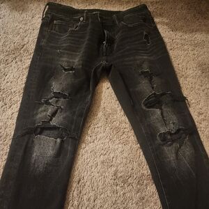 Black skinny ripped jeans